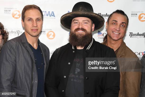 Jimmy De Martini, Zac Brown and Daniel de los Reyes of the Zac Brown Band pose at a photo call on day three of C2C Country to Country 2017 Festival...