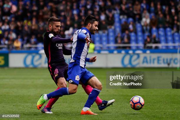 Jordi Alba defender of FC Barcelona battles for the ball with Carles Gil midfielder of Deportivo de La Coruña during the La Liga Santander match...