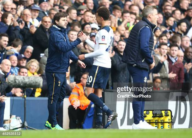 Referee Martin AtkinsonTottenham Hotspur manager Mauricio Pochettino shanks hands with Tottenham Hotspur's Dele Alli during the The Emirates FA Cup -...