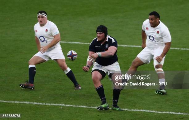 Zander Fagerson of Scotland passes the ball during the RBS Six Nations match between England and Scotland at Twickenham Stadium on March 11, 2017 in...