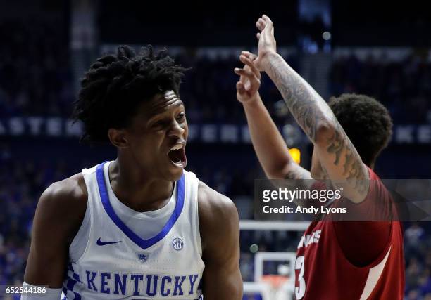 De'Aaron Fox of the Kentucky Wildcats reacts against Dustin Thomas of the Arkansas Razorbacks during the championship game at the 2017 Men's SEC...