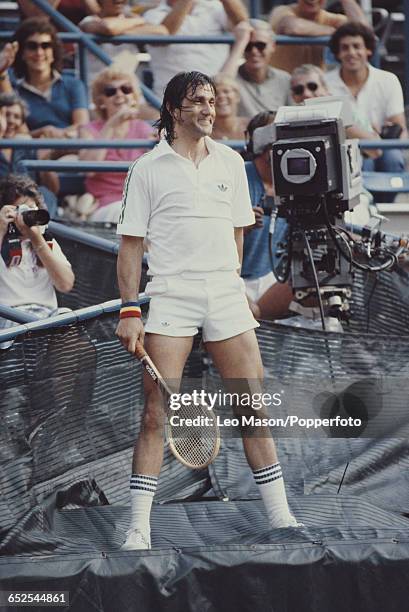 Romanian tennis player Ilie Nastase pictured in action during competition to reach the second round of the 1980 US Open Men's Singles tennis...