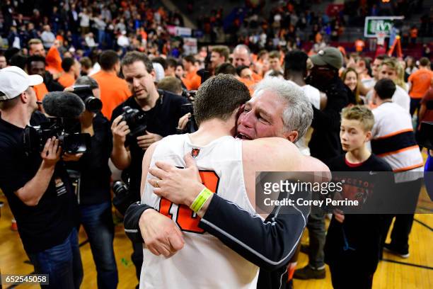 Spencer Weisz of the Princeton Tigers is hugged by his teary-eyed father, Andrew Weisz, expressing how proud he is during the second half of the Ivy...