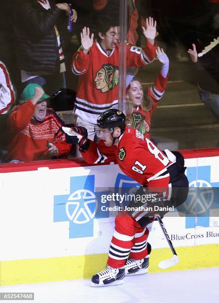 Marian Hossa of the Chicago Blackhawks celebrates a third period goal against the Minnesota Wild at the United Center on March 12, 2017 in Chicago,...