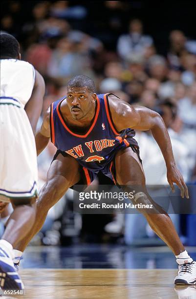 Larry Johnson of the New York Knicks guards his player during the game against the Dallas Mavericks at the Reunion Arena in Dallas, Texas. The...
