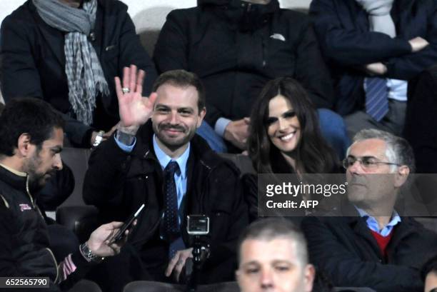 The president of Palermo's football club, Paul Baccaglini and partner Thais Wiggers are seen in the stands before the Italian Serie A football match...