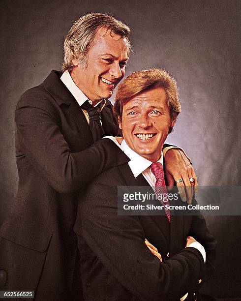 Actor Tony Curtis as Danny Wilde and Roger Moore as Lord Brett Sinclair in the television series 'The Persuaders!', circa 1971.