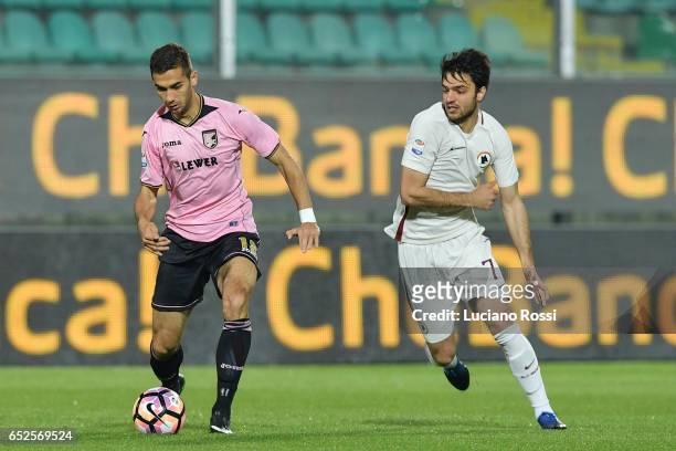 Roma player Clemente Grenier competes with US Citt di Palermo player Ivaylo Chochev during the Serie A match between US Citta di Palermo and AS Roma...