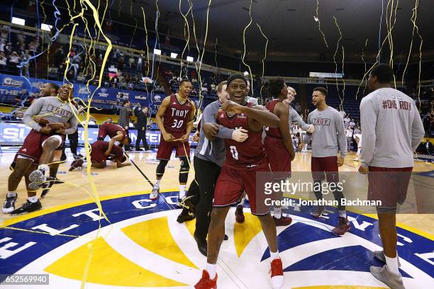 The Troy Trojans celebrate after the championship game of the Sun Belt Basketball Tournament against the Texas State Bobcats at UNO Lakefront Arena...
