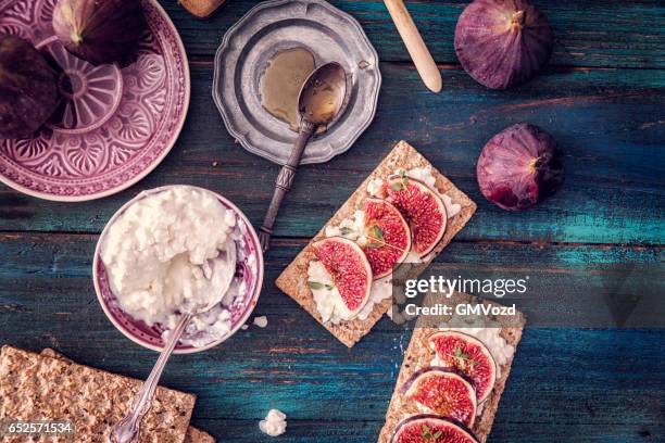 crispbread with serrano ham, cottage cheese, and figs - knäckebrot stock pictures, royalty-free photos & images