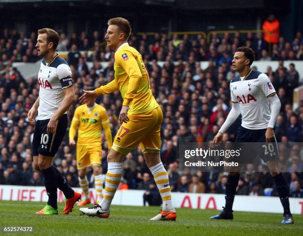 Tottenham Hotspur's Harry Kane, Millwall's Byron Webster and Tottenham Hotspur's Dele Alli during the The Emirates FA Cup - Sixth Round match between...