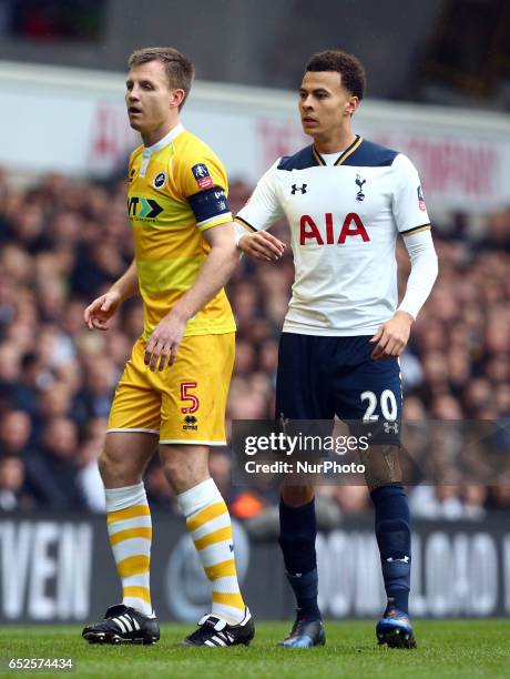 Millwall's Tony Craig and Tottenham Hotspur's Dele Alli during the The Emirates FA Cup - Sixth Round match between Tottenham Hotspur and Millwall at...