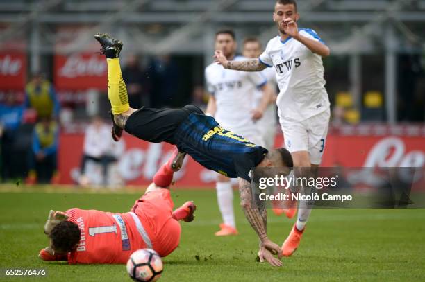 Etrit Berisha of Atalanta BC causes a penalty on Mauro Icardi of FC Internazionale during the Serie A football match between FC Internazionale and...