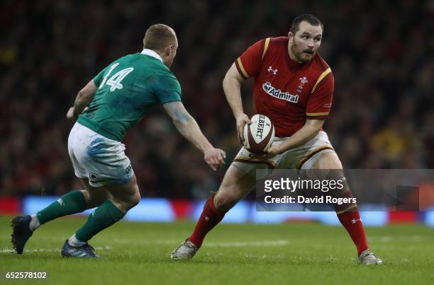 Ken Owens of Wales runs with the ball during the RBS Six Nations match between Wales v Ireland at the Principality Stadium on March 10, 2017 in...