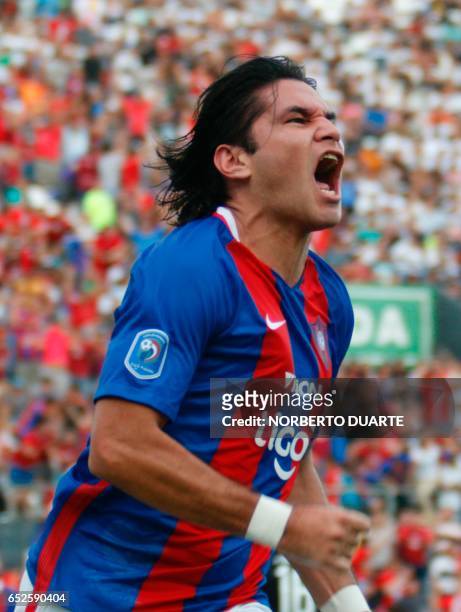Cerro Porteno's footballer Guillermo Beltran celebrates after scoring against Olimpia during their Paraguayan apertura 2017 tournament match at the...