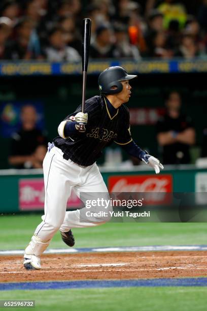 Shogo Akiyama of Team Japan hits and RBI single in the700018649 third inning during Game 2 of Pool E of the 2017 World Baseball Classic against Team...