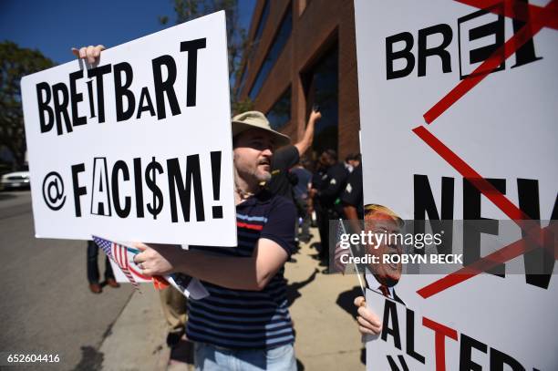 Protesters demonstrate on the street outside what they say is the offices of Breitbart News, formerly run by Trump adminstration chief strategist...
