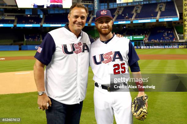 Former Major League Player Al Leiter poses for a photo with Jonathan Lucroy of Team USA after the ceremonial first pitch prior to Game 6 of Pool C of...