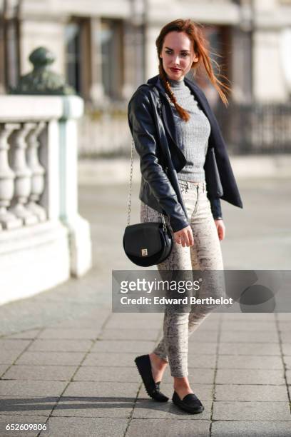 Ophelie Duvillard, model and fashion blogger, wears Bobbies shoes, IKKS snake print leggings pants, a Primark gray wool turtleneck top, a Newlook...