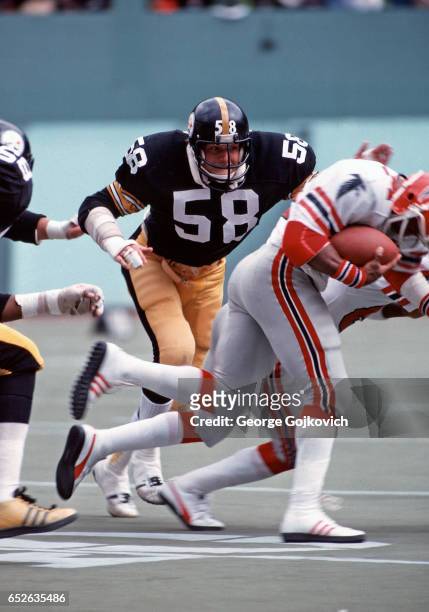 Linebacker Jack Lambert of the Pittsburgh Steelers pursues the play during a game against the Atlanta Falcons at Three Rivers Stadium on October 8,...