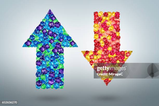 up and down arrows - red dice stock pictures, royalty-free photos & images