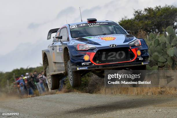 Thierry Neuville of Belgium and Nicolas Gilsoul of Belgium compete in their Hyundai Motorsport Hyundai i2o Coupè WRC during Day Three of the WRC...