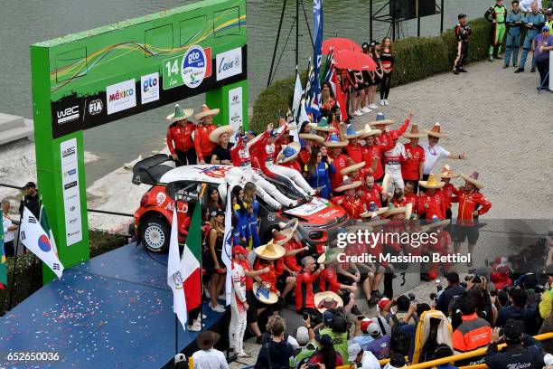 Kris Meeke of Great Britain and Paul Nagle of Ireland are celebrating their success during Day Three of the WRC Mexico on March 12, 2017 in Leon,...