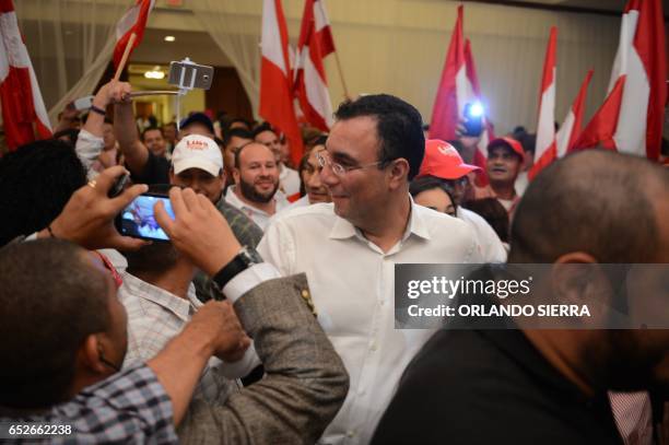 Opposition candidate of the Liberty Party, Luis Zelaya, meets supporters after declaring victory in the primary elections in Tegucigalpa, on March...