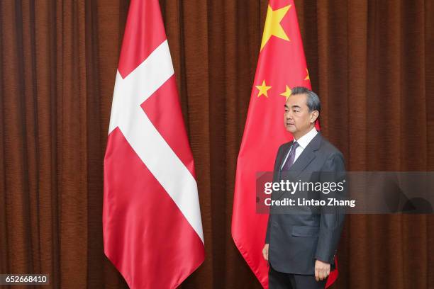Chinese Foreign Minister Wang Yi waits for the meeting with Denmark's Foreign Minister Anders Samuelsen at the Ministry of Foreign Affairs on March...