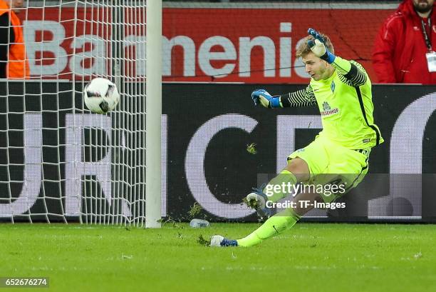 Goalkeeper Felix Wiedwald of Werder Bremen controls the ball during the Bundesliga soccer match between Bayer Leverkusen and Werder Bremen at the...