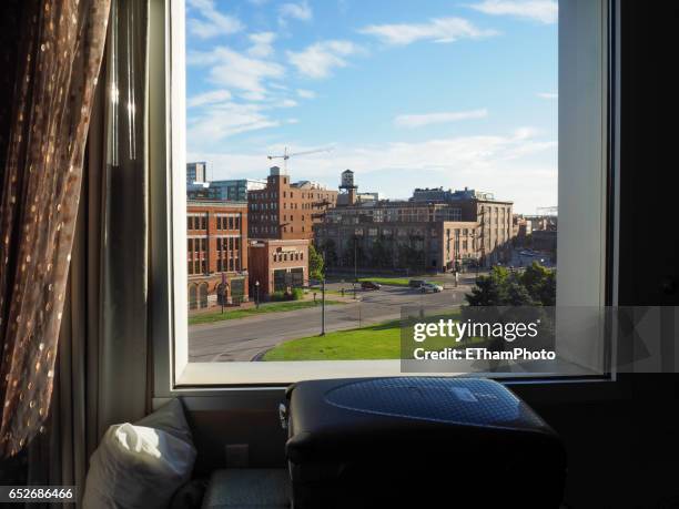 looking out of window on denver lower downtown district (lodo) - downtown denver stock pictures, royalty-free photos & images