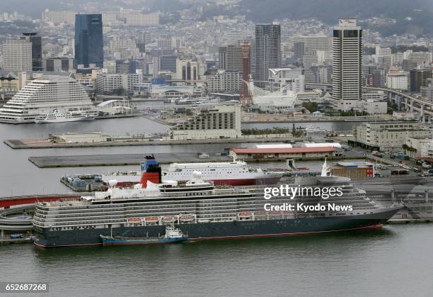 Luxury liner Queen Elizabeth arrives at the port of Kobe, Japan, on March 13, 2017. The 90,901-ton cruise ship is on an around-the-world voyage. The...