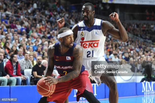 Tyrese Rice, #2 guard of FC Barcelona and Othello Hunter, #21 center of Real Madrid during the Liga Endesa game between Real Madrid v FC Barcelona at...