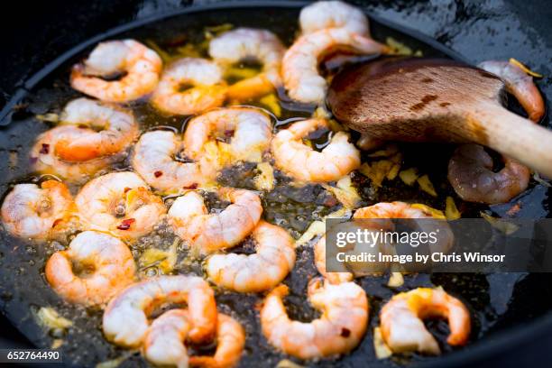 frying prawns - saute stock pictures, royalty-free photos & images