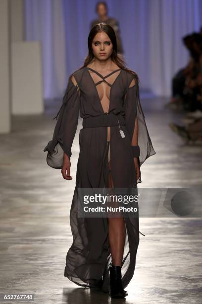 Model presents a creation from the Portuguese fashion designer Dino Alves Fall/Winter 2017/2018 collection during the Lisbon Fashion Week -...