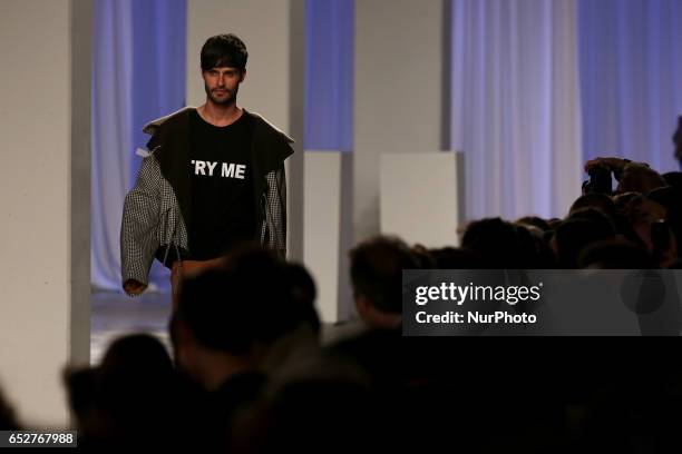 Model presents a creation from the Portuguese fashion designer Dino Alves Fall/Winter 2017/2018 collection during the Lisbon Fashion Week -...