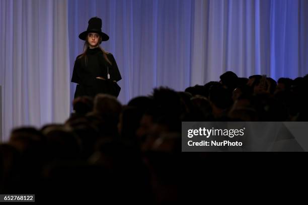 Model presents a creation from the Portuguese fashion designer Dino Alves Fall/Winter 2017/2018 collection during the Lisbon Fashion Week -...