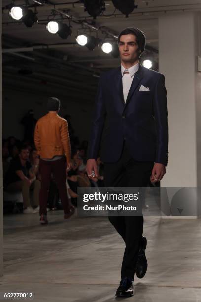 Model presents a creation from the Portuguese fashion designer Nuno Gama Fall/Winter 2017/2018 collection during the Lisbon Fashion Week - ModaLisboa...