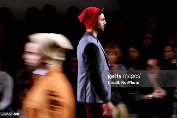 Model presents a creation from the Portuguese fashion designer Nuno Gama Fall/Winter 2017/2018 collection during the Lisbon Fashion Week - ModaLisboa...