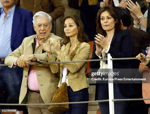 Mario Vargas Llosa, Isabel Preysler and Nuria Gonzalez attend the traditional Spring Bullfighting performance on March 11, 2017 in Illescas, Spain.