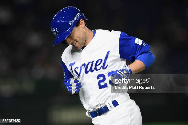 Outfielder Sam Fuld of Israel reacts after lining out in the bottom of the first inning during the World Baseball Classic Pool E Game Three between...