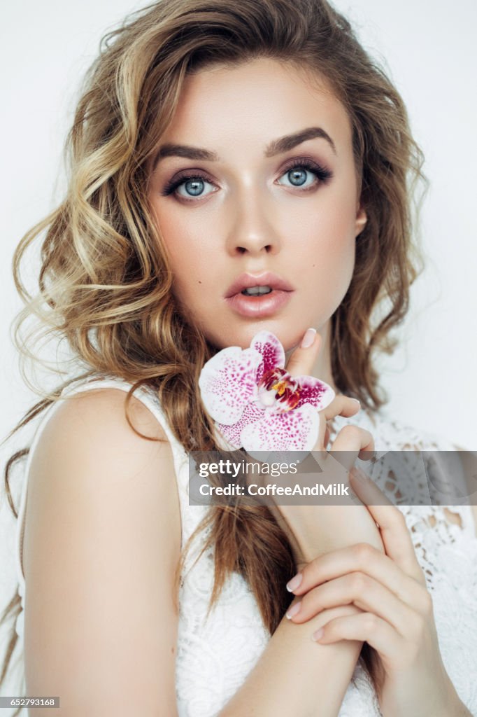 Beautiful woman with flowers