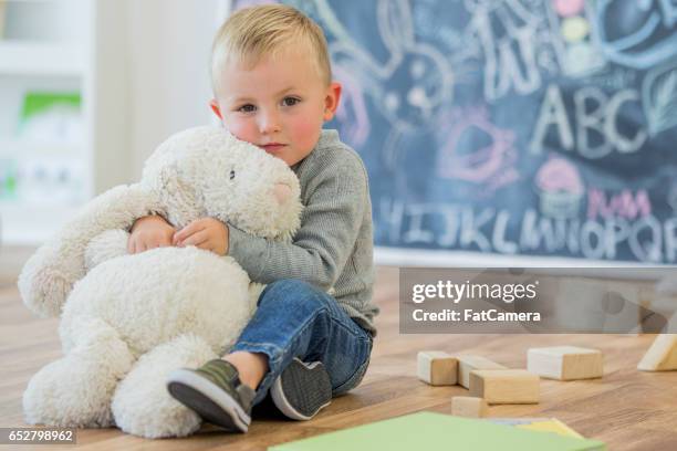 playing with a stuffed animal - wood tick stock pictures, royalty-free photos & images