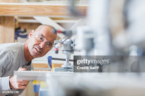 Shutterhand Worker Senior Man Working In Shutter Factory On Machinery High-Res Stock Photo ...