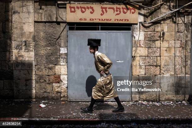 Ultra Orthodox Jews celebrating holiday of Purim on March 13, 2017 in Jerusalem, Israel. The carnival-like Purim holiday is celebrated with parades...