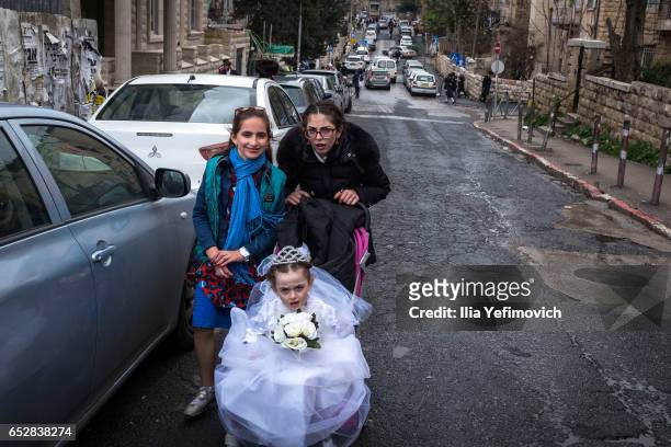Ultra Orthodox Jews celebrating holiday of Purim on March 13, 2017 in Jerusalem, Israel. The carnival-like Purim holiday is celebrated with parades...