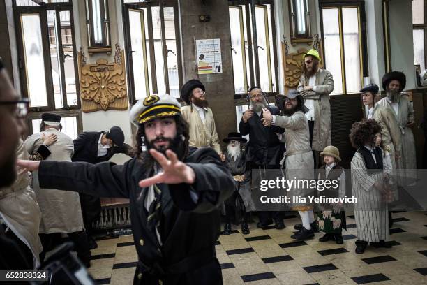 Ultra Orthodox Jews celebrating holiday of Purim on March 13, 2017 in Jerusalem, Israel. The carnival-like Purim holiday is celebrated with parades...