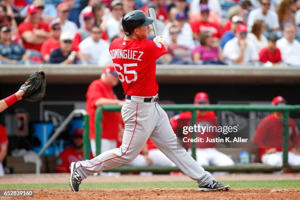 Matt Dominguez of the Boston Red Sox in action against the Philadelphia Phillies during a spring training game at Spectrum Field on March 12, 2017 in...