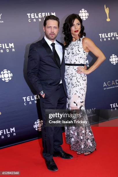 Jason Priestley and Cindy Sampson attend the Academy of Canadian Cinema & Television's 2017 Canadian Screen Awards at the Sony Centre for Performing...