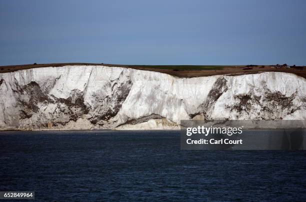 The White Cliffs of Dover are pictured from a cross channel ferry on March 13, 2017 in Dover, England. The White Cliffs of Dover are identified as a...